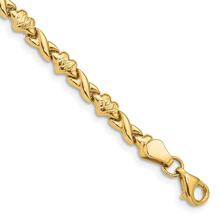 Lovely Rita's Bracelets 14k yellow gold bracelet X and Heart Design. 7-inch