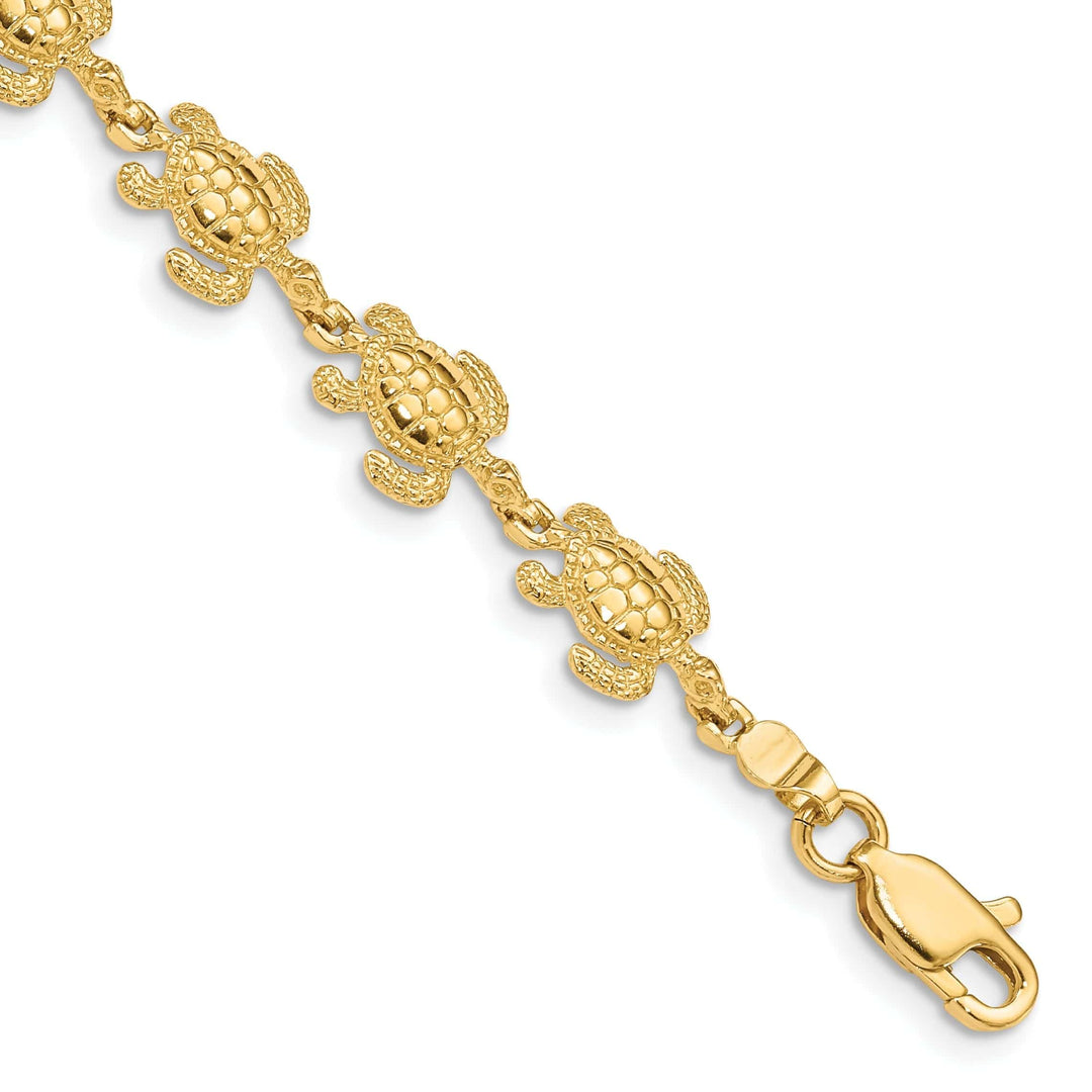 Lovely Rita's Bracelets 14k Yellow Gold Solid Sea Turtle Bracelet. Polished finish, 8mm width, 7.25" length