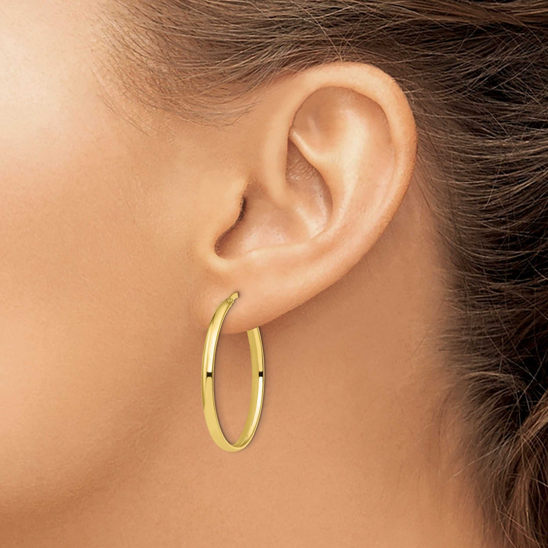 Lovely Rita's Earrings 10k Yellow Gold Oval Hoop Earrings