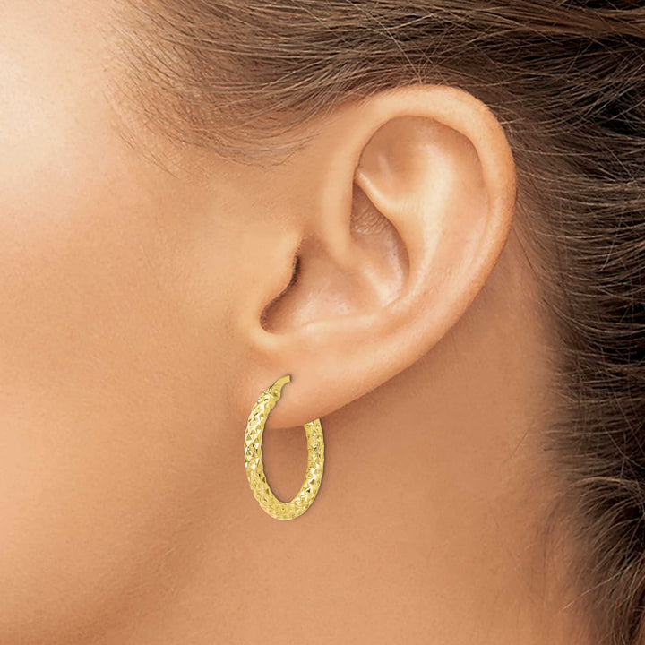 Lovely Rita's Earrings 10k Yellow Gold Polish D.C Hoop Earring