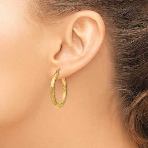 Lovely Rita's Earrings 10k Yellow Gold Satin Diamond Cut Round Hoop Earring