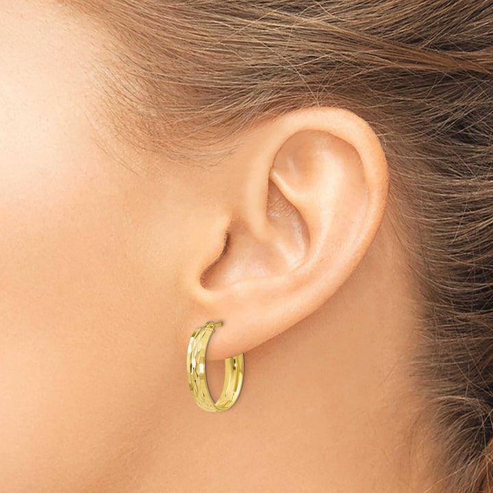 Lovely Rita's Earrings 10kt Yellow Gold D.C Oval Hinged Hoop Earrings
