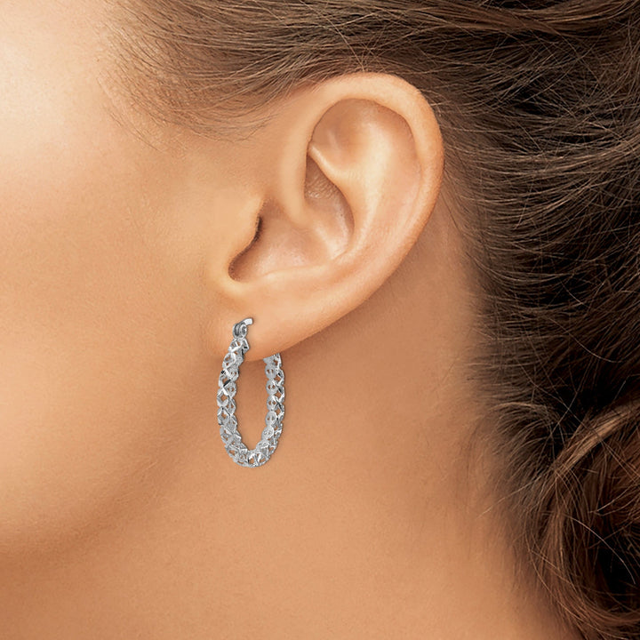 Lovely Rita's Earrings 14K White Polished D.C Hollow Hoop Earrings