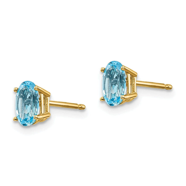 Lovely Rita's Earrings 14k Yellow Gold Blue Topaz Birthstone Earrings