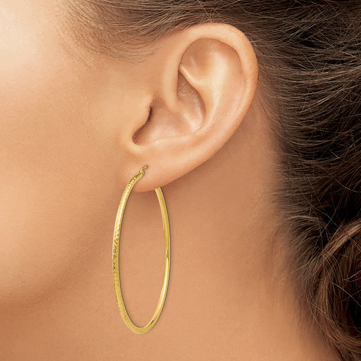 Lovely Rita's Earrings 14k Yellow Gold Diamond Cut 2MM Hoop Earrings