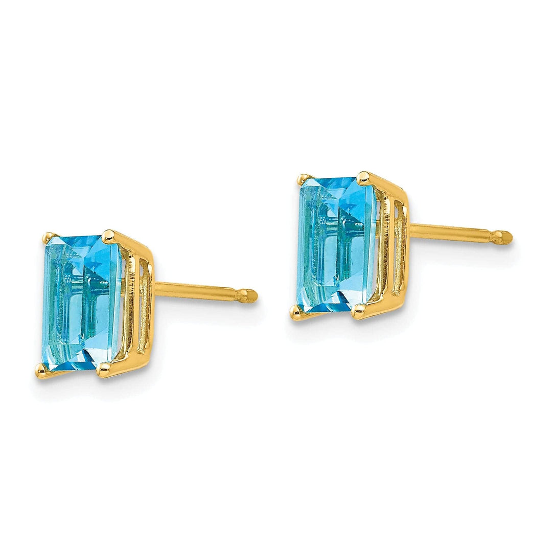 Lovely Rita's Earrings 14k Yellow Gold Emerald Cut Blue Topaz Earring