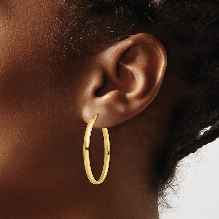 Lovely Rita's Earrings 14k Yellow Gold Polish Oval Hoop Earrings